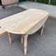 Renovated Louis Philippe round extendable dining table with flaps and 3 extensions.
