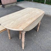 Renovated Louis Philippe round extendable dining table with flaps and 3 extensions.