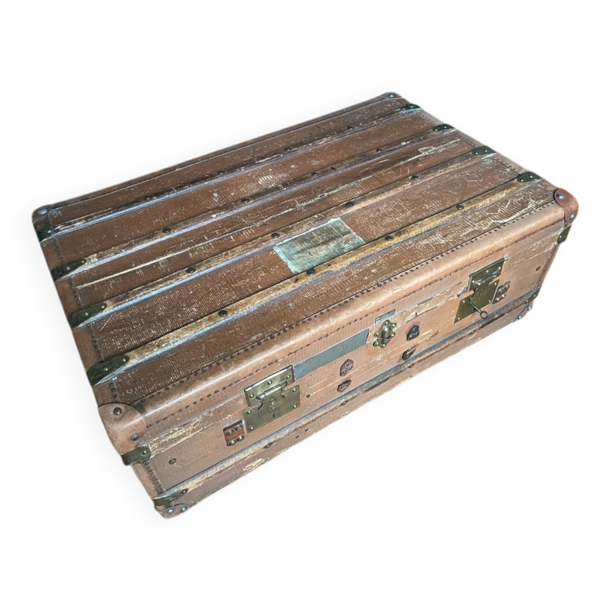Large antique trunk with a key closure.