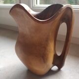 Olive wood pitcher.