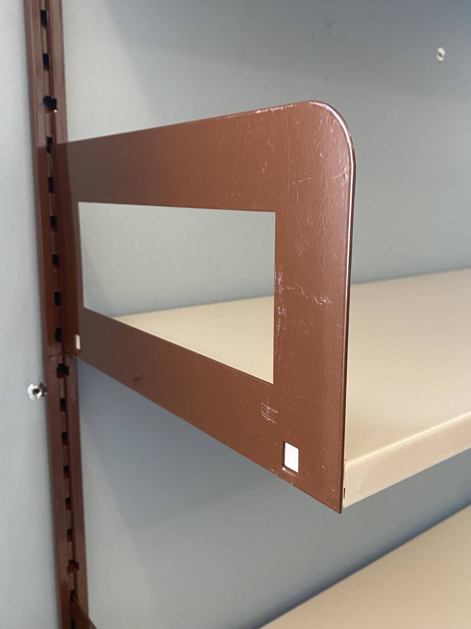 Modular metal wall shelf in brown and beige vintage 70s design.