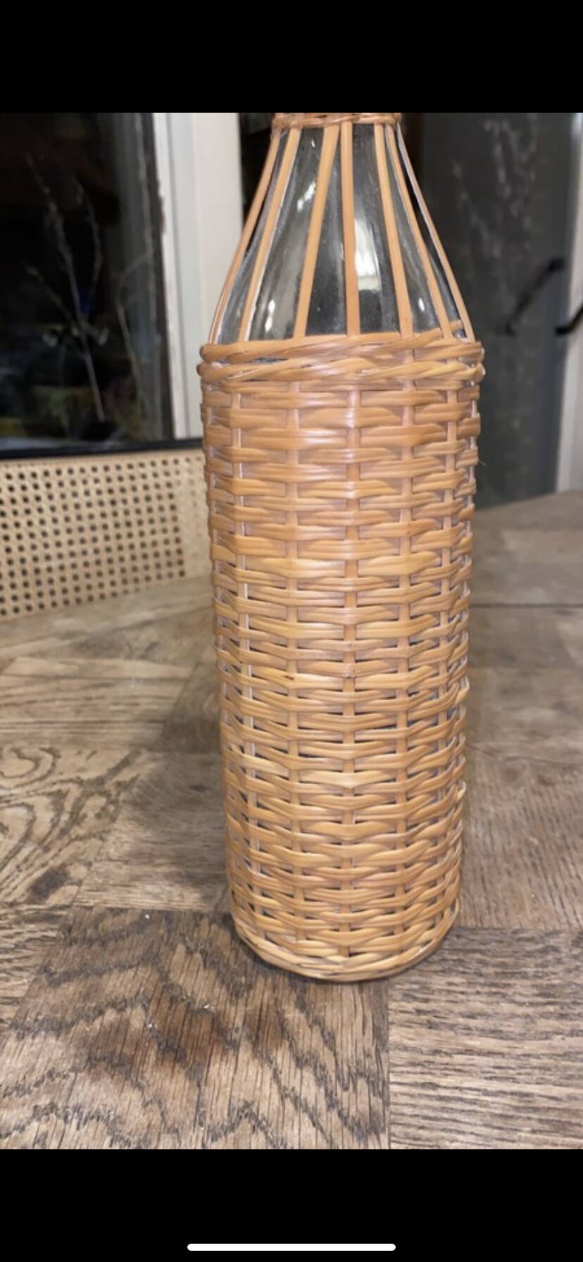 Bottle surrounded wicker