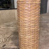 Bottle surrounded wicker