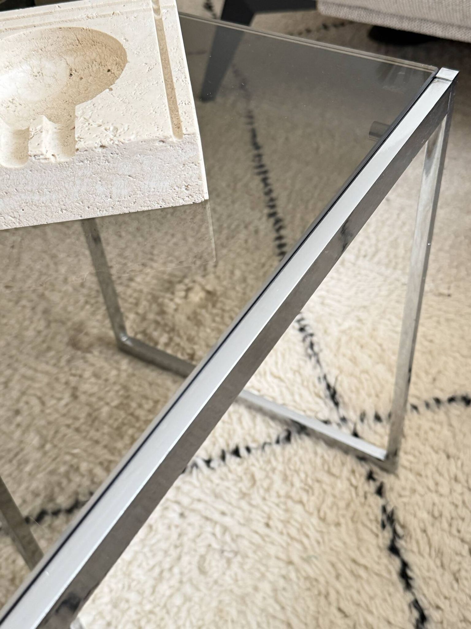 Set of 2 vintage nesting coffee tables in chrome metal and smoked glass.