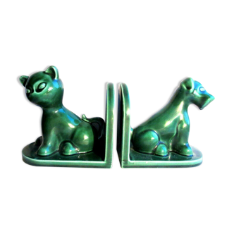 Art Deco bookends in green ceramic, dog and cat on terrace