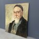 Old portrait of man painted on wooden panel