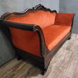 Sleeper or bench from the Charles X period in richly carved mahogany.