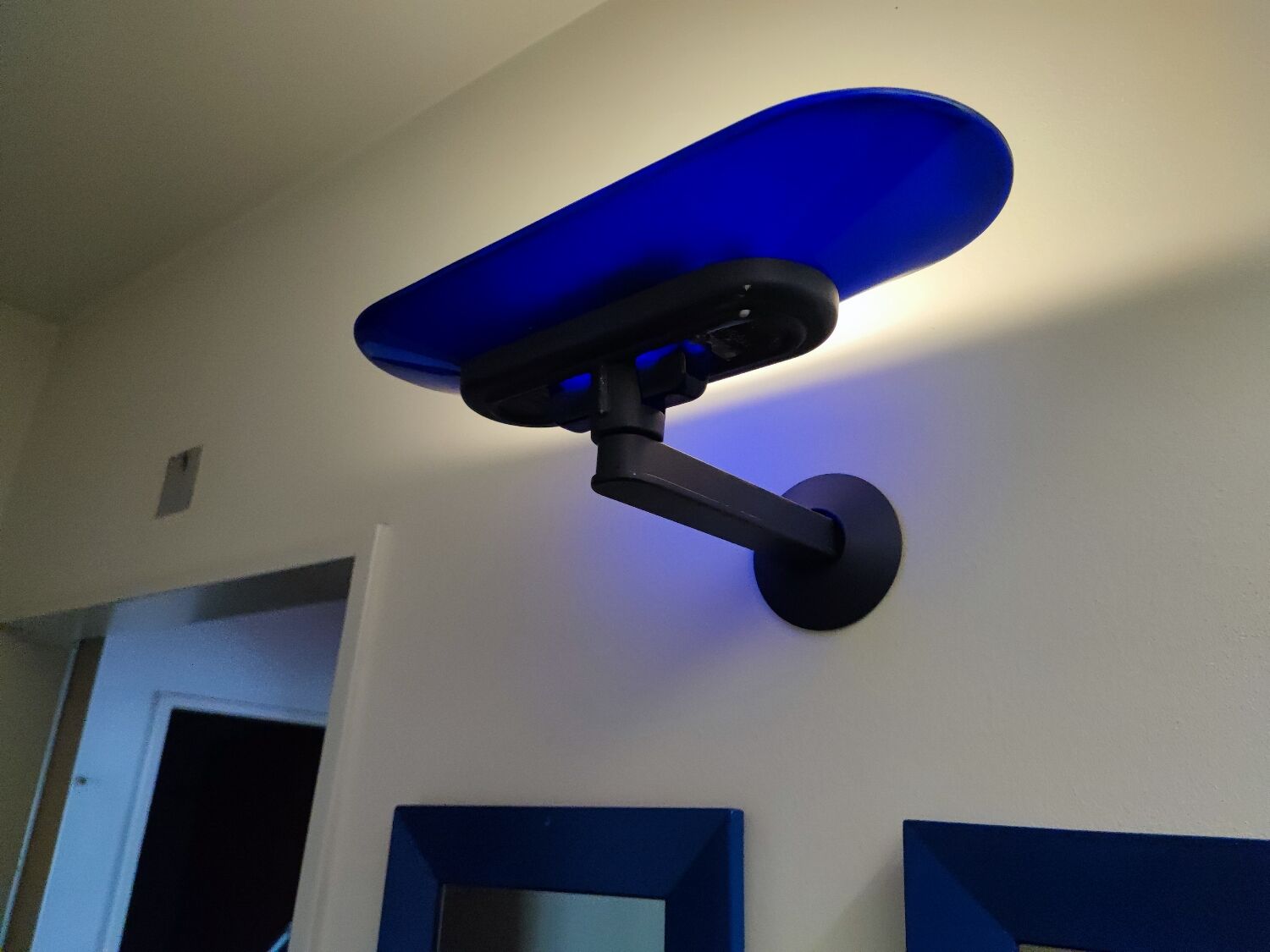 Arteluce wall light. The Wall