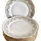 8 white and gold porcelain dessert plates