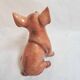 Beautiful, handcrafted porcelain figurine of a piglet, made by Capodimon.