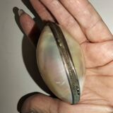 Old mother-of-pearl rosary in its egg box