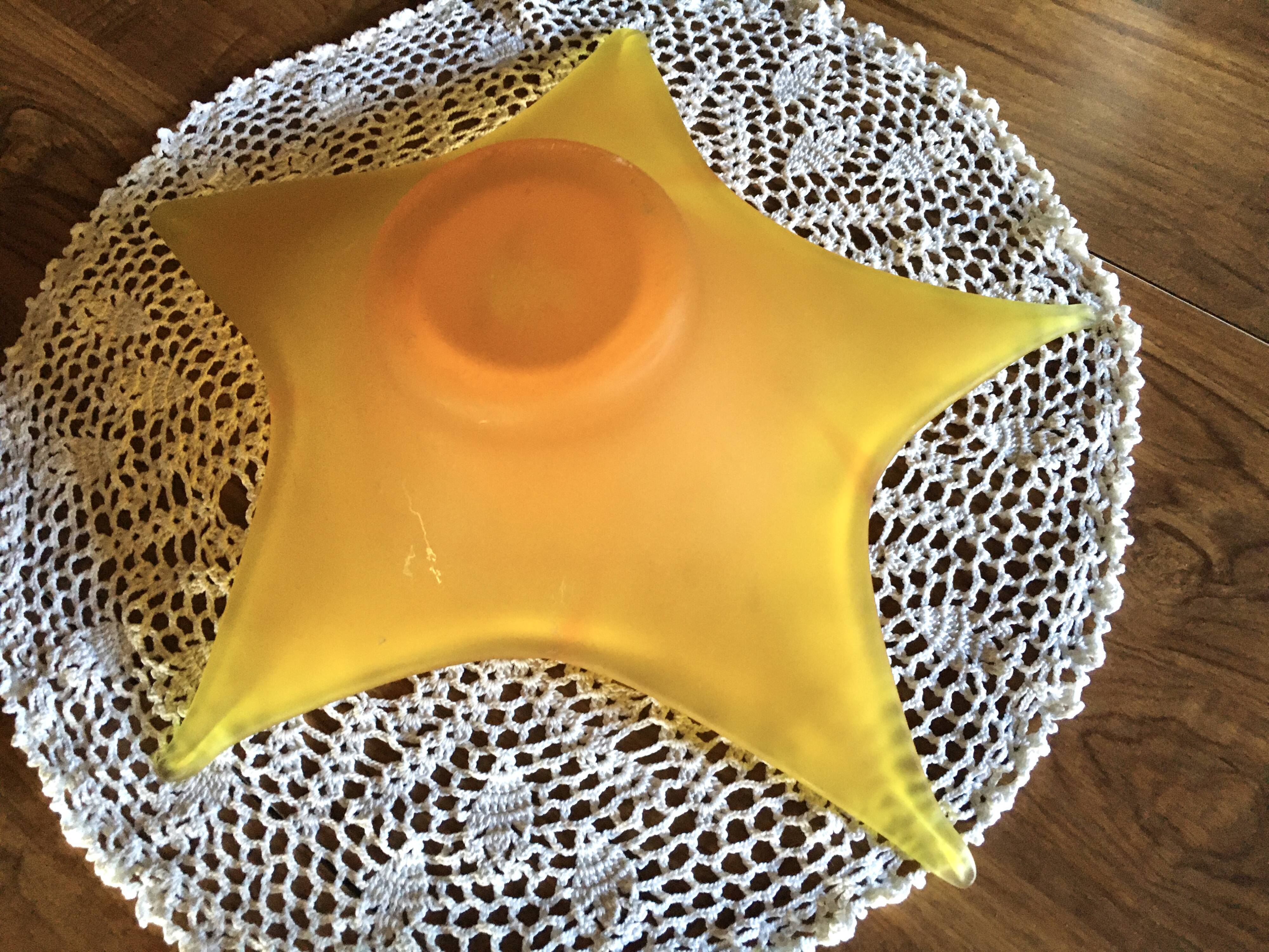 Star in orange glass paste