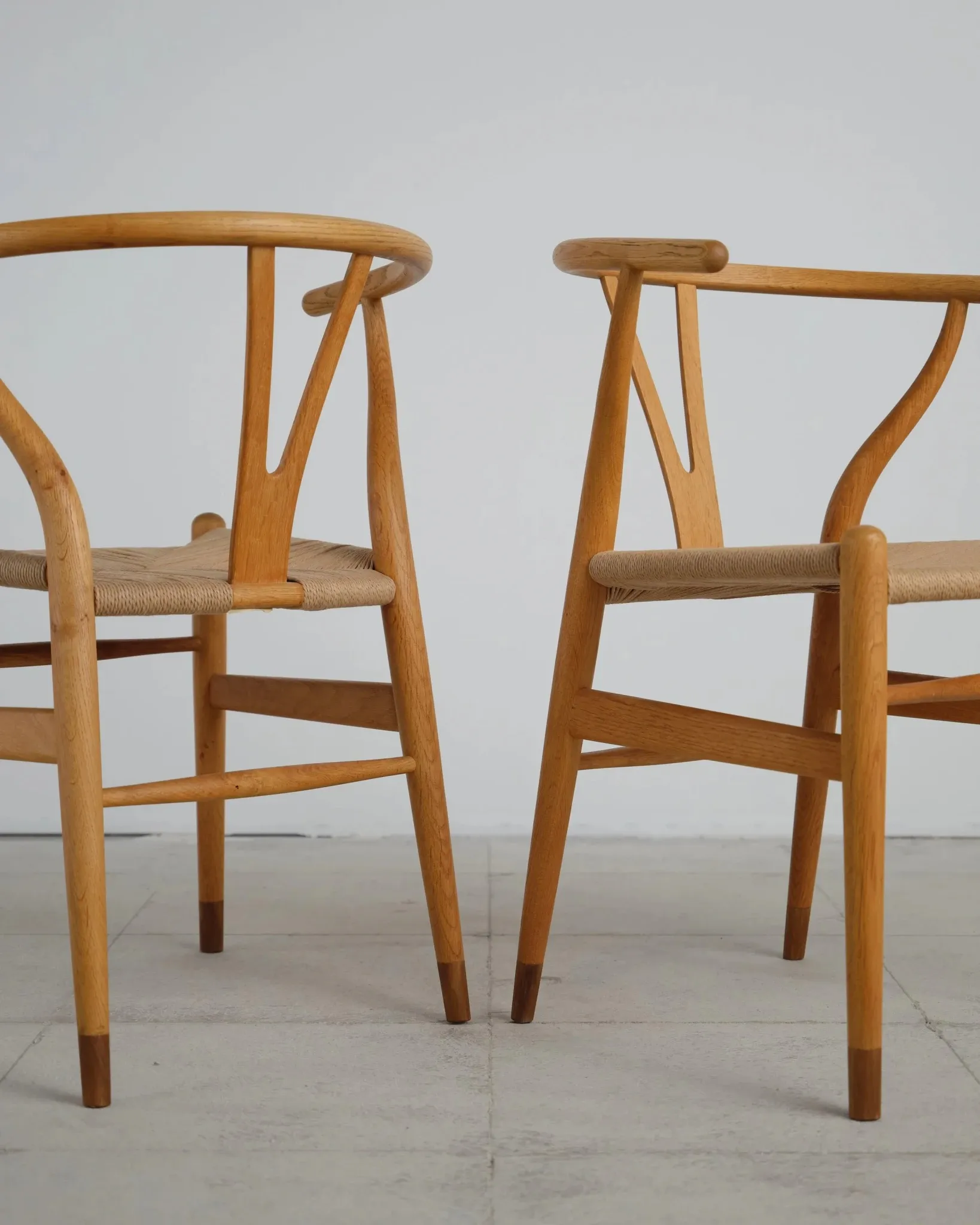Pair of CH24 Wishbone chairs by Hans J. Wegner, Denmark, 1970s