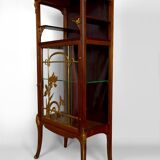 Art Nouveau display case, bronzes and carved wood on a floral theme, circa 1900