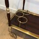 Rolling table in brass and mahogany with removable trays