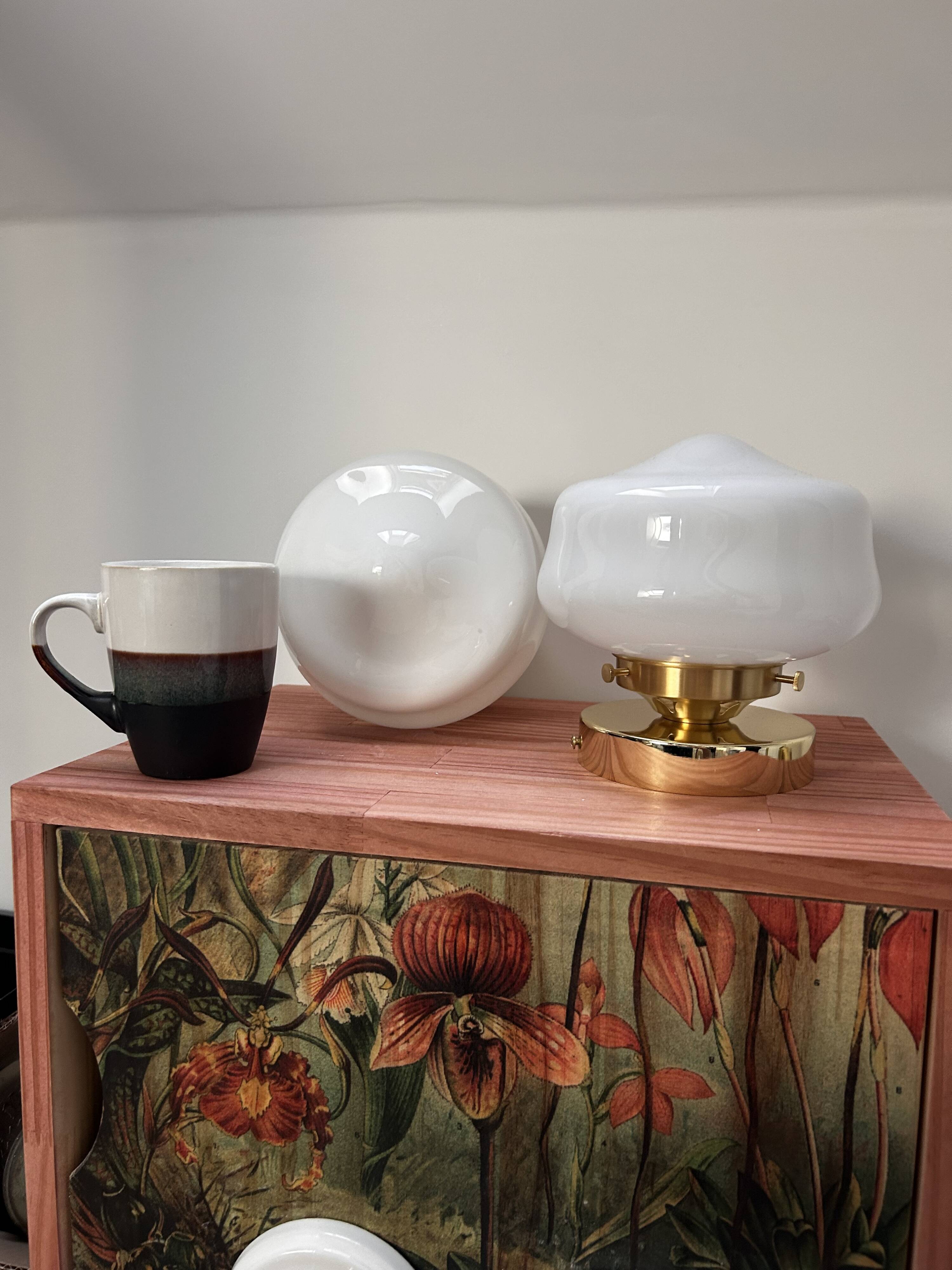 Pair of white opaline globe wall lights