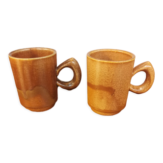 Duo of vintage stoneware cups