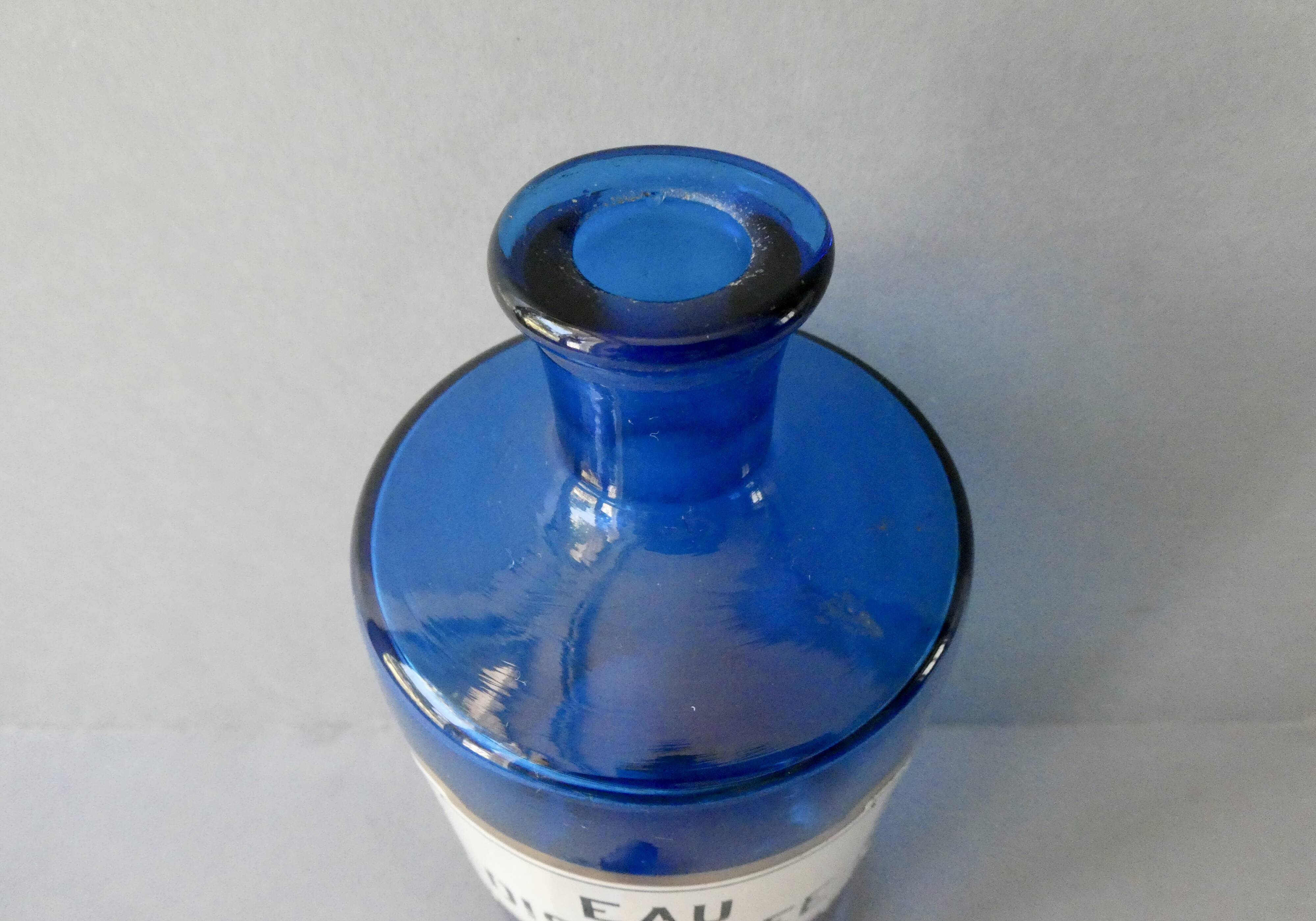 Bottle, pharmacy bottle in blue blown glass