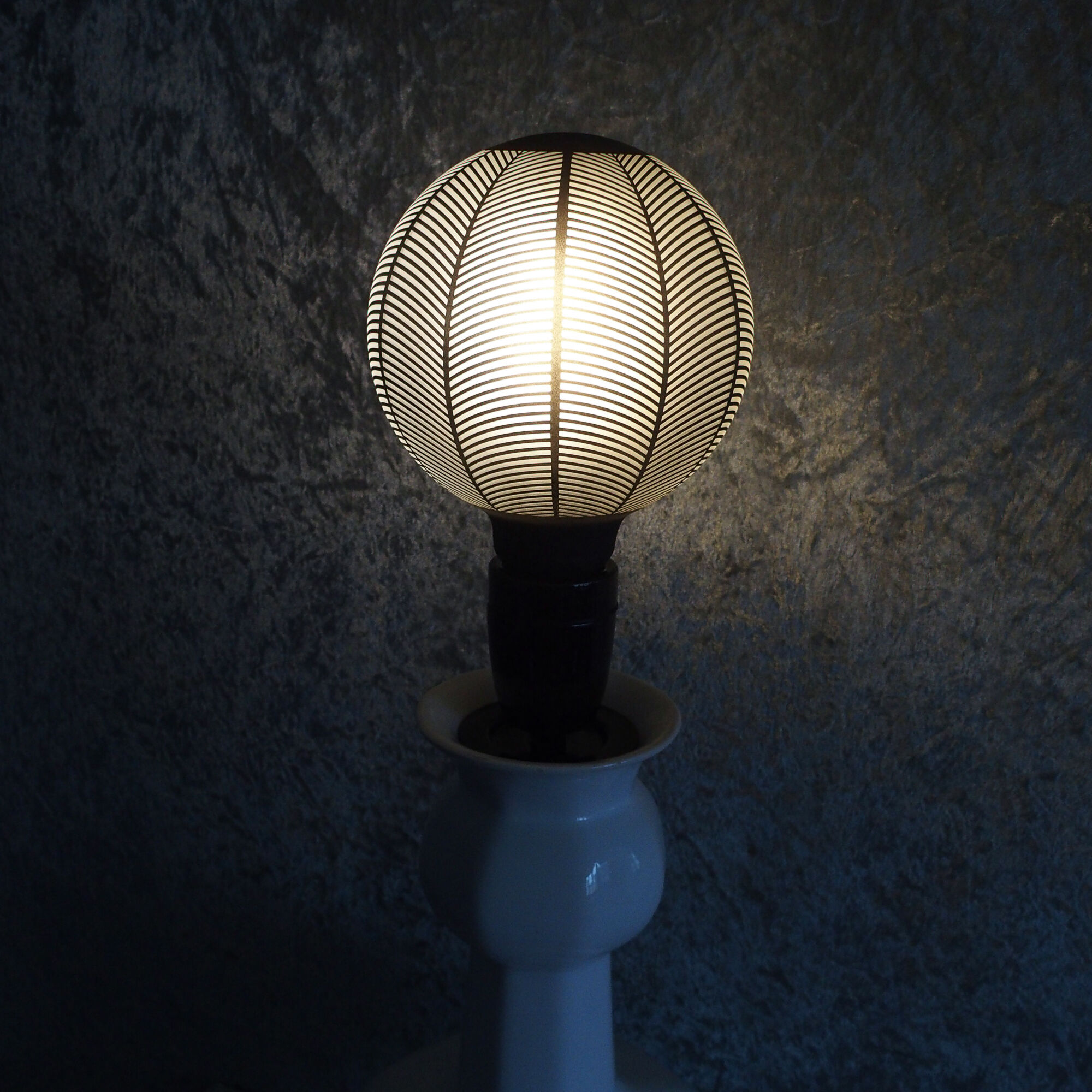 Art Deco-inspired white ceramic lamp