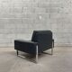 Pair of black leather armchairs