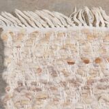 Tapis en laine beige vintage