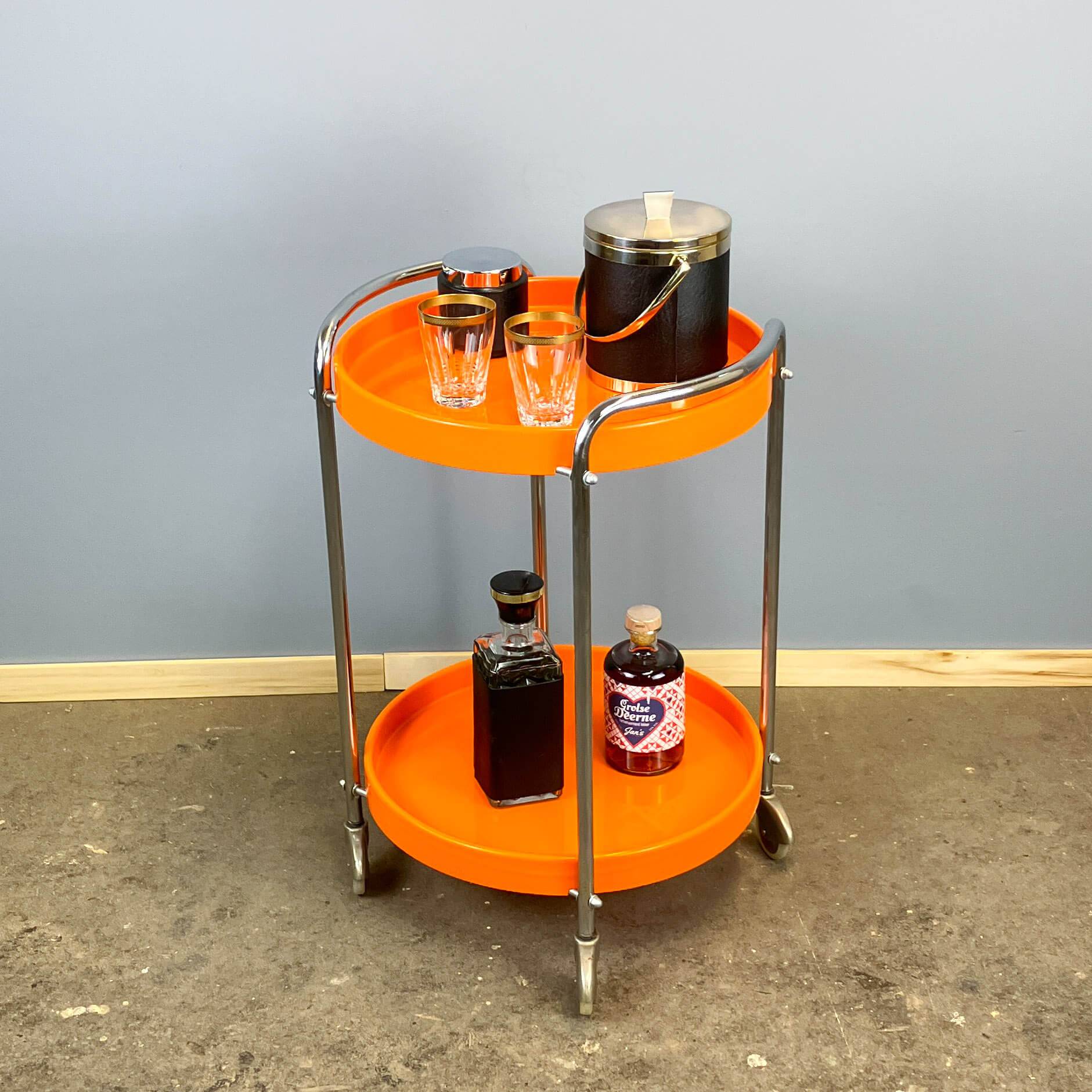 Space Age serving trolley, chrome and orange plastic trays, 1970s