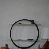 Decorative shelf unit, round metal frames with curved legs and glass shelves, 1960.