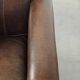 Characterful set of two sheepskin design armchairs with beautiful patina