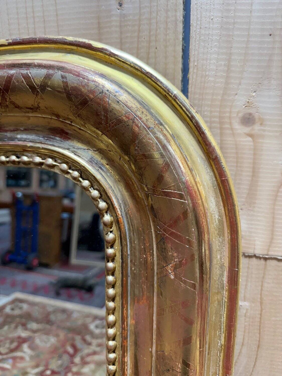 Louis-Philippe period mirror – Wood, stucco, and gold leaf