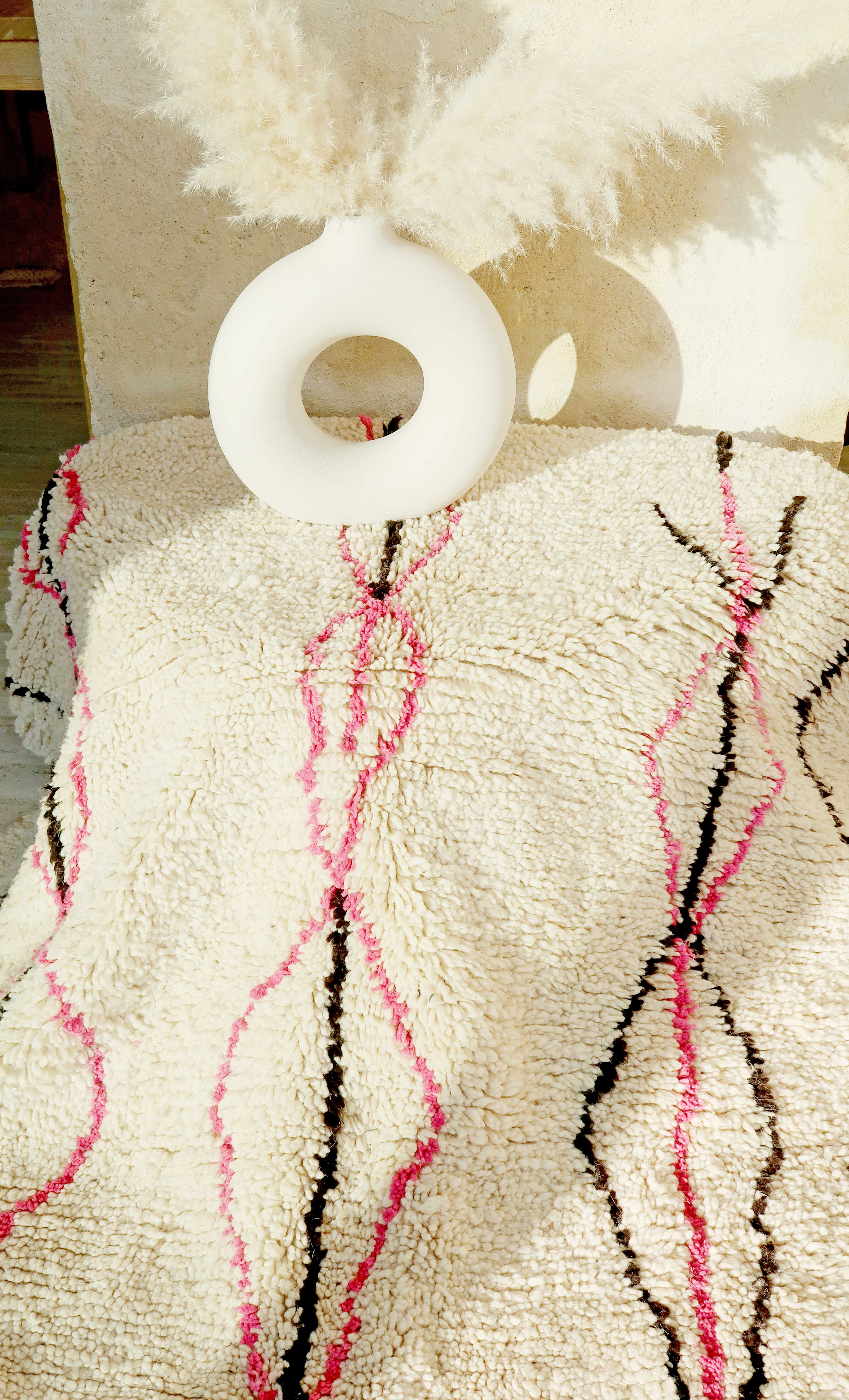 Boujaad Berber rug in pink and black colored wool woven in Morocco 220x140cm