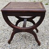 Cross-footed cane stool