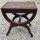Cross-footed cane stool