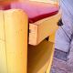 Bedside Louis XV patinated yellow and red