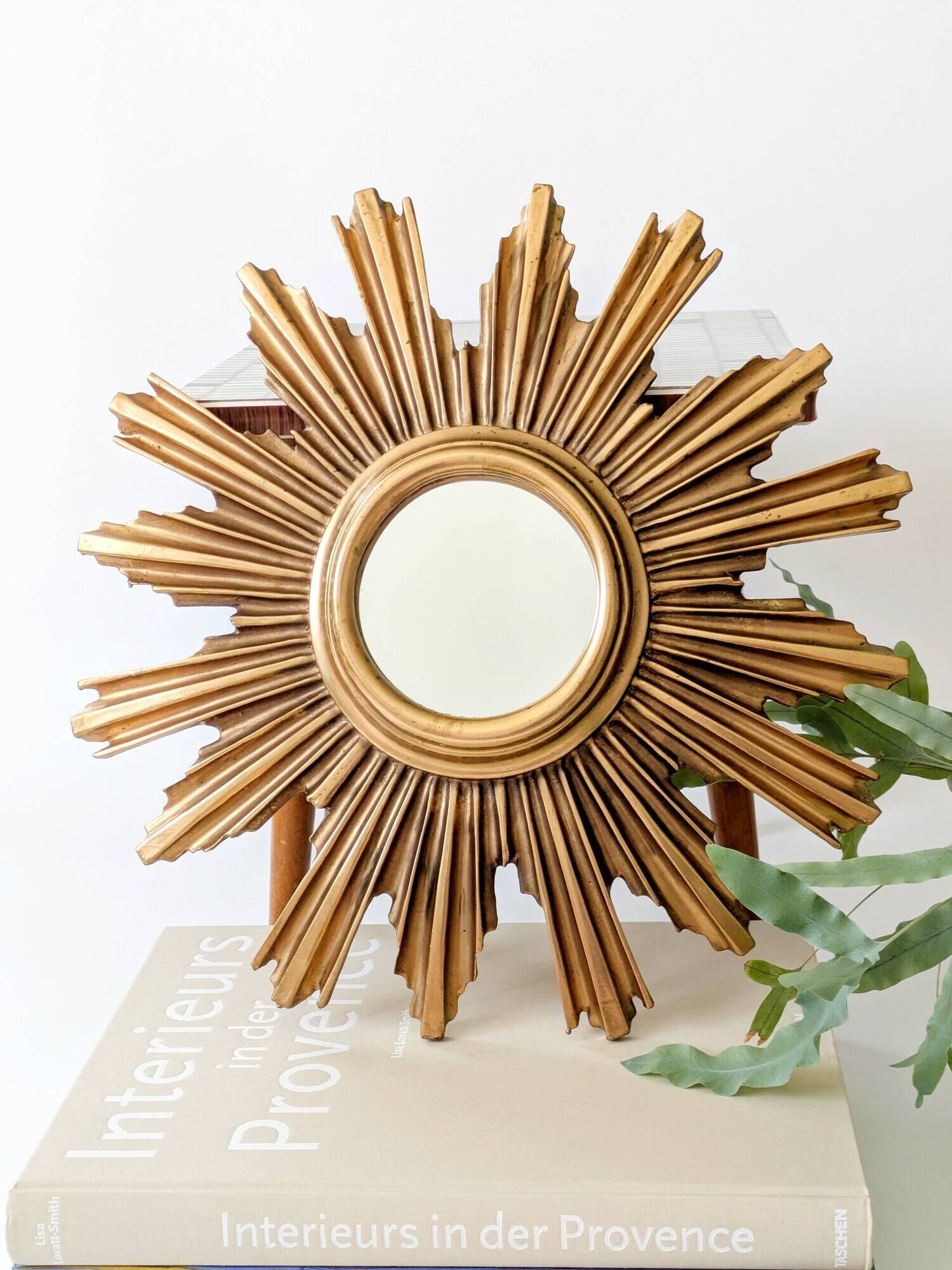 Vintage sunburst mirror in wood and gold resin, 1960s–70s