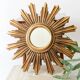 Vintage sunburst mirror in wood and gold resin, 1960s–70s