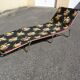 Folding chaise longue cous camp bed with flowers vintage brand Castel Joyeux