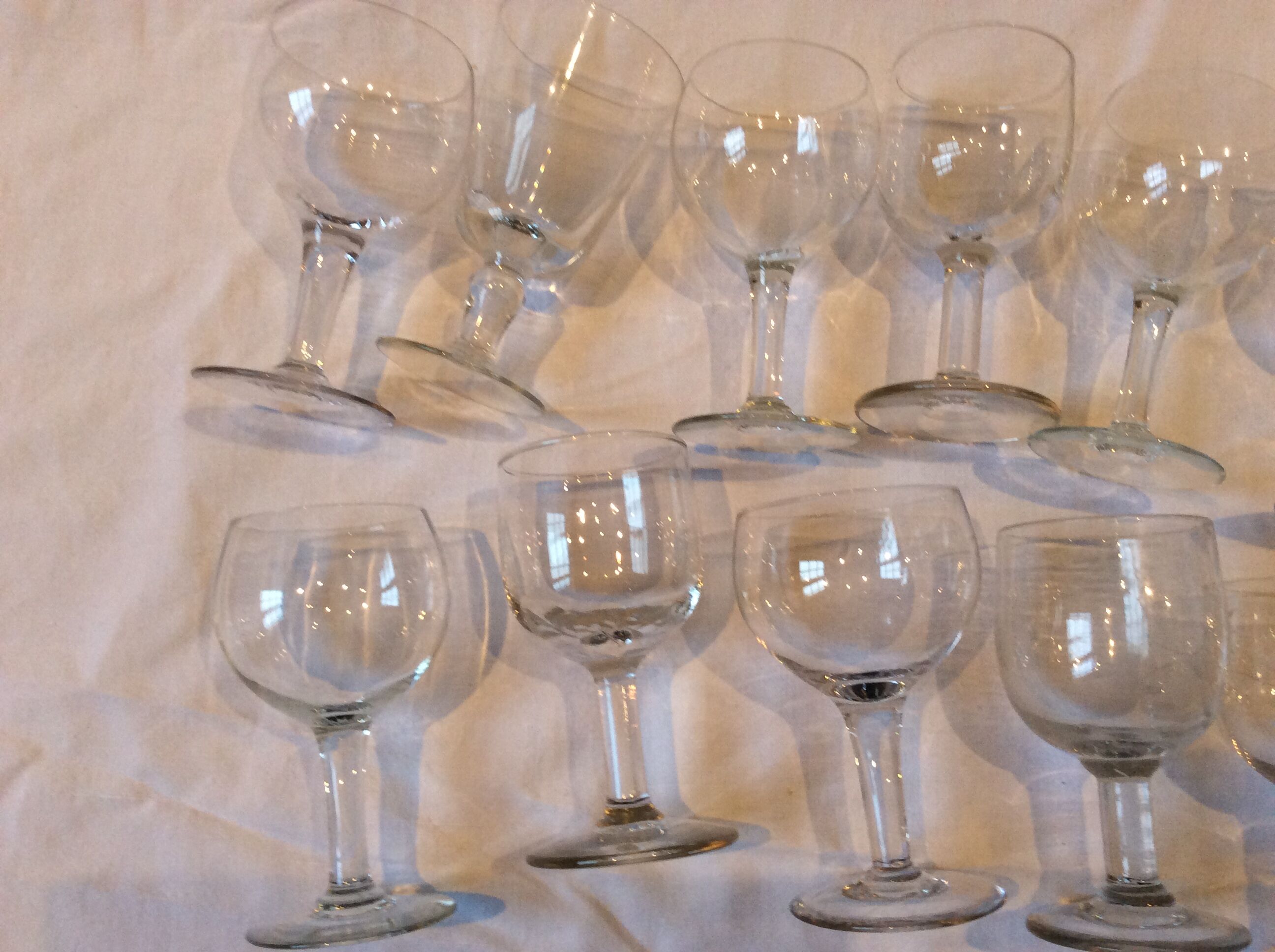 15 mismatched old glasses