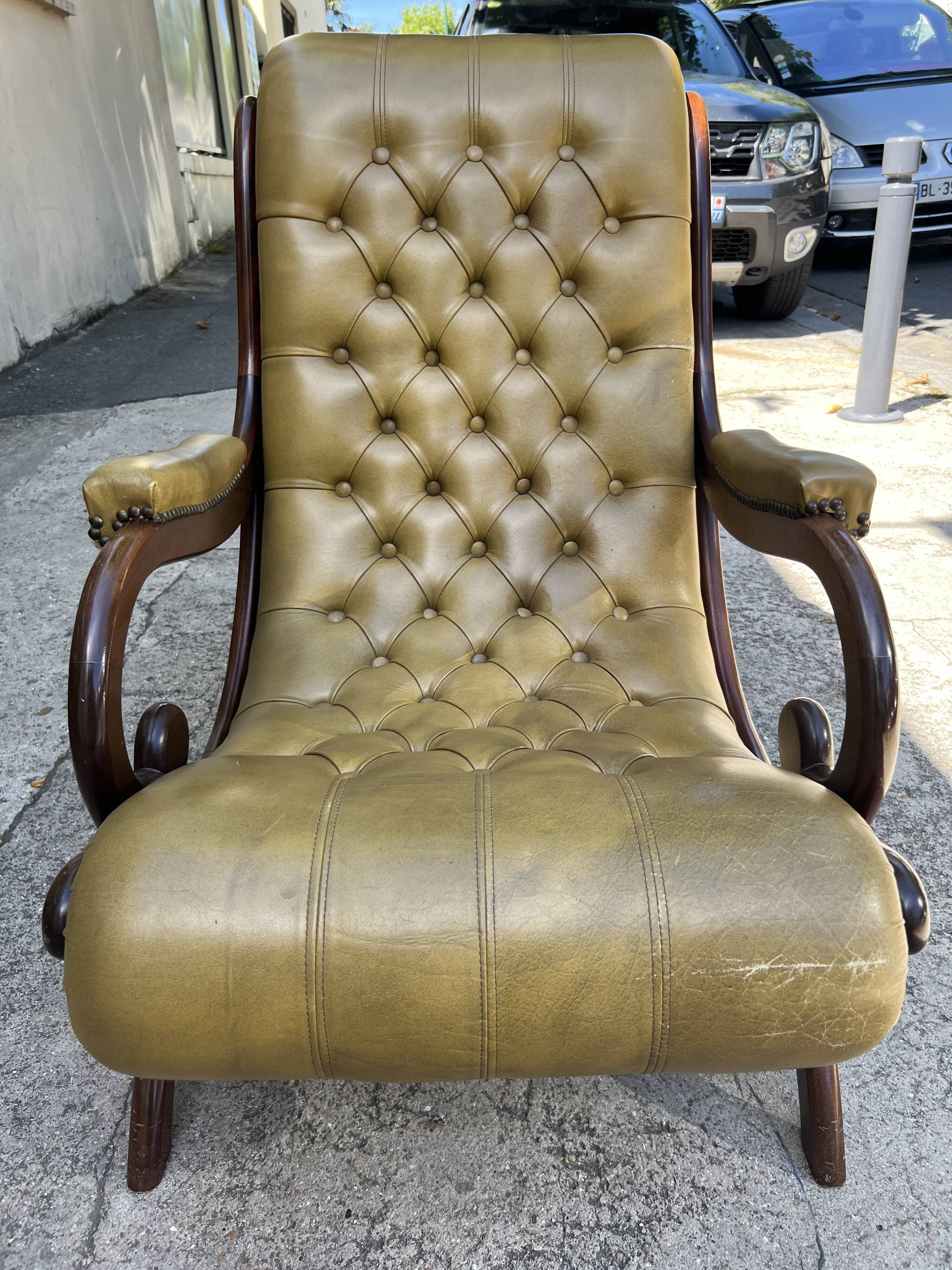 Victoria style green leather chesterfield armchair