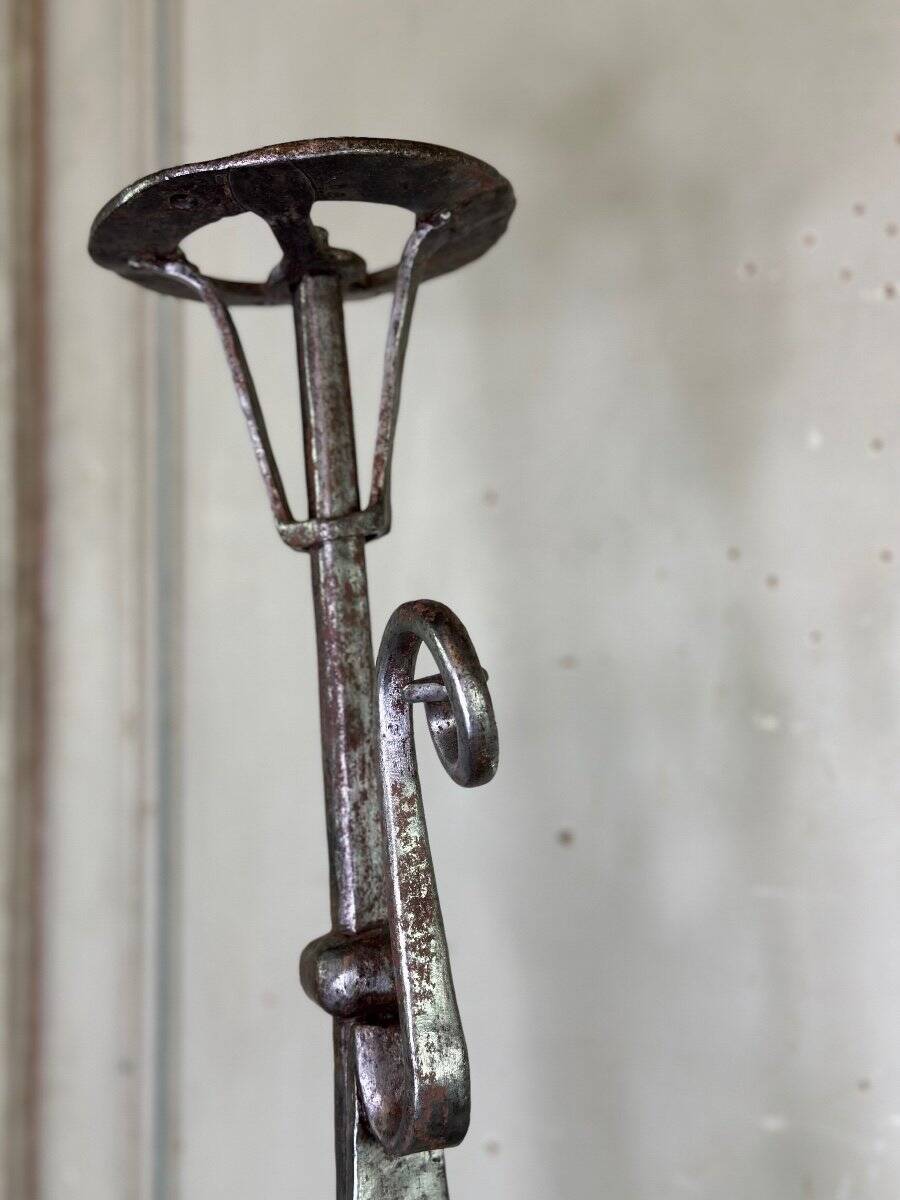 Pair of wrought iron candlesticks, 18th century