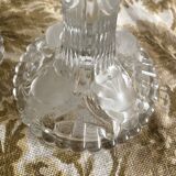 Pair of moulded glass candlesticks, ram heads and masks