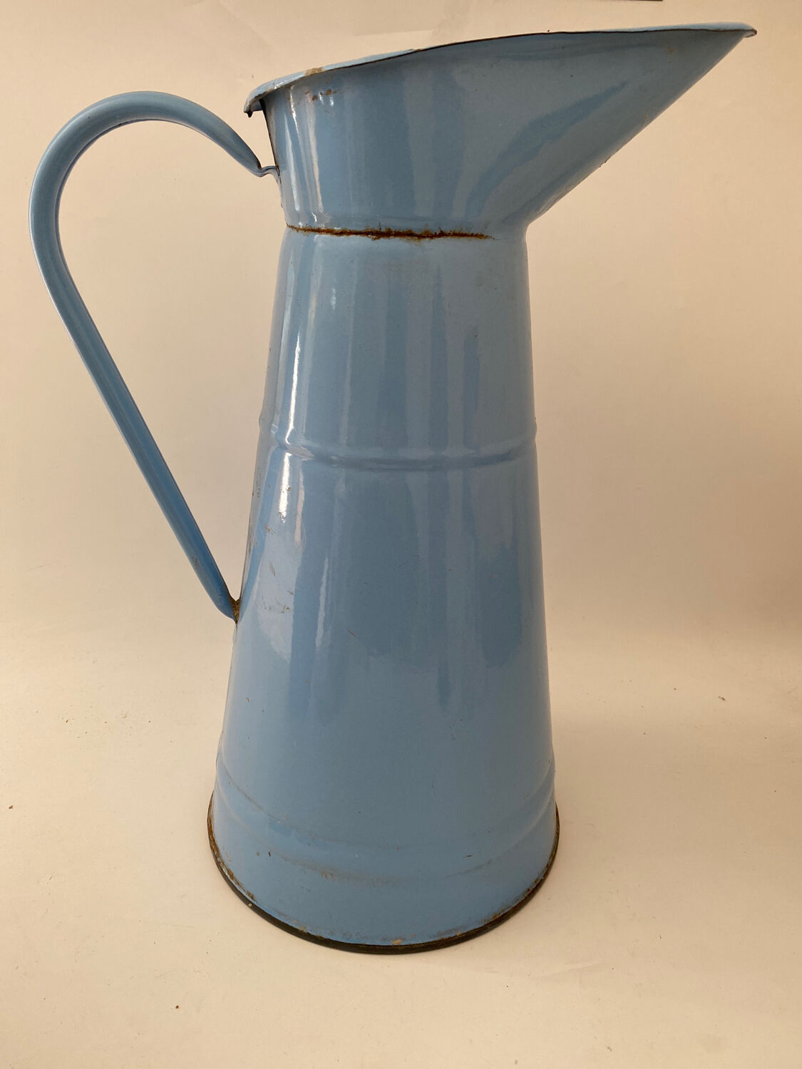 Blue watering can