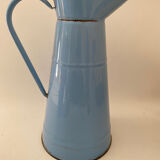 Blue watering can