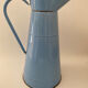 Blue watering can
