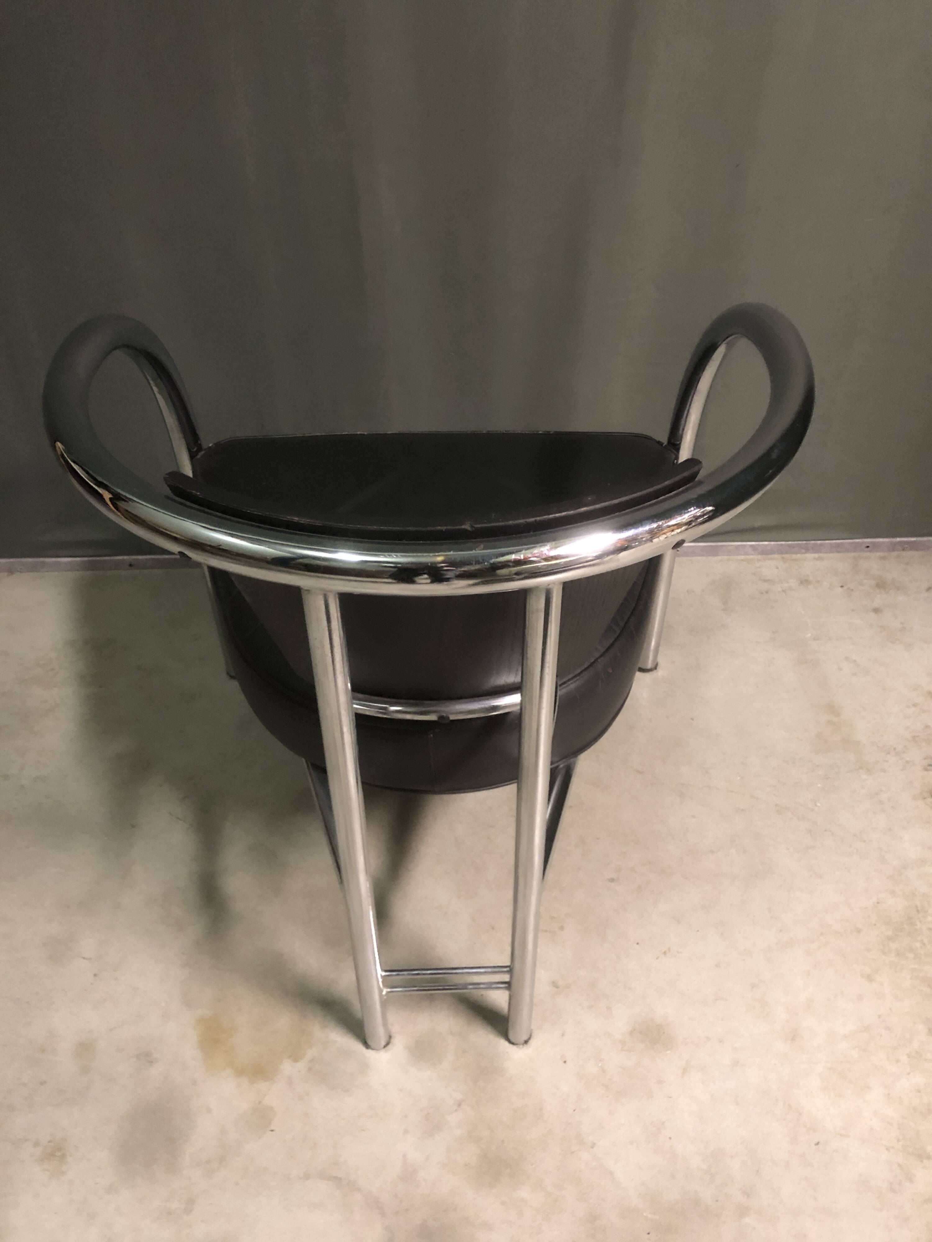 A pair of petite low armchairs by ronald cecil sportes for lumen center, 1987