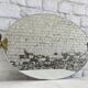 Vintage oval pivoting mirror in gilded brass with dolphins / Barber