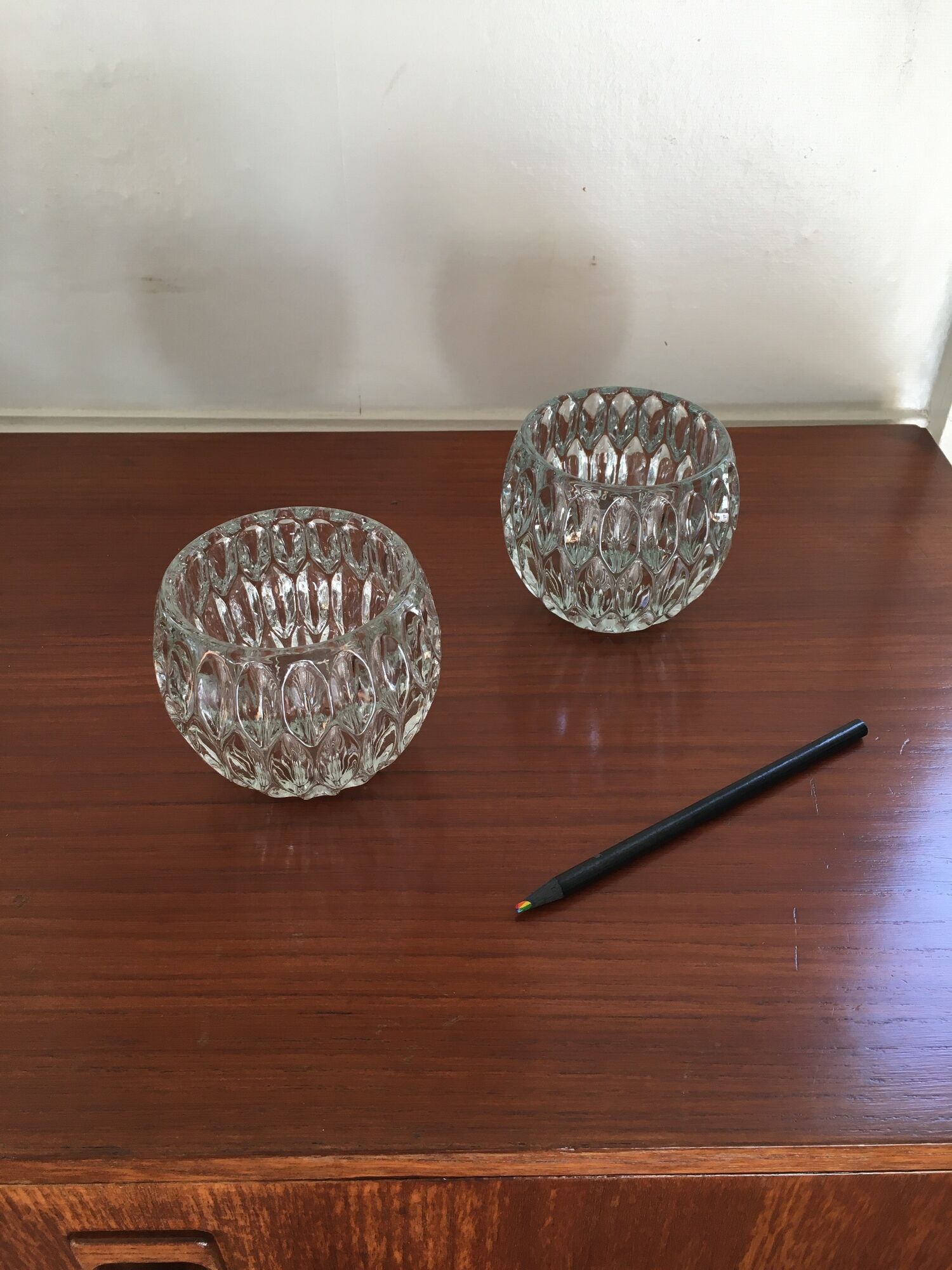Duo of chiseled glass photophores