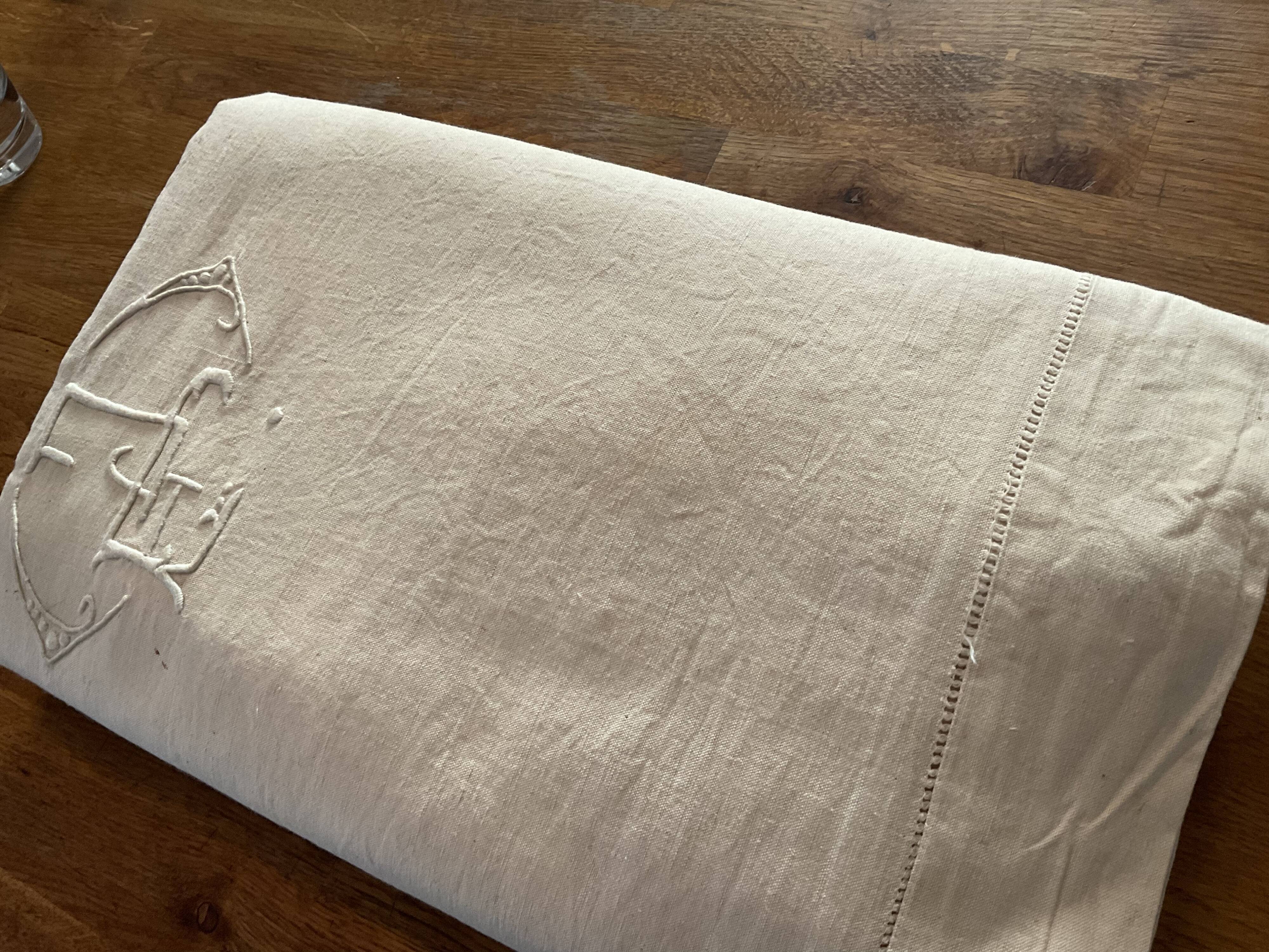 Old embroidered sheet, ec monogram