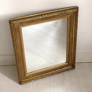 Small wooden mirror with gilded stucco in the Louis XVI style.