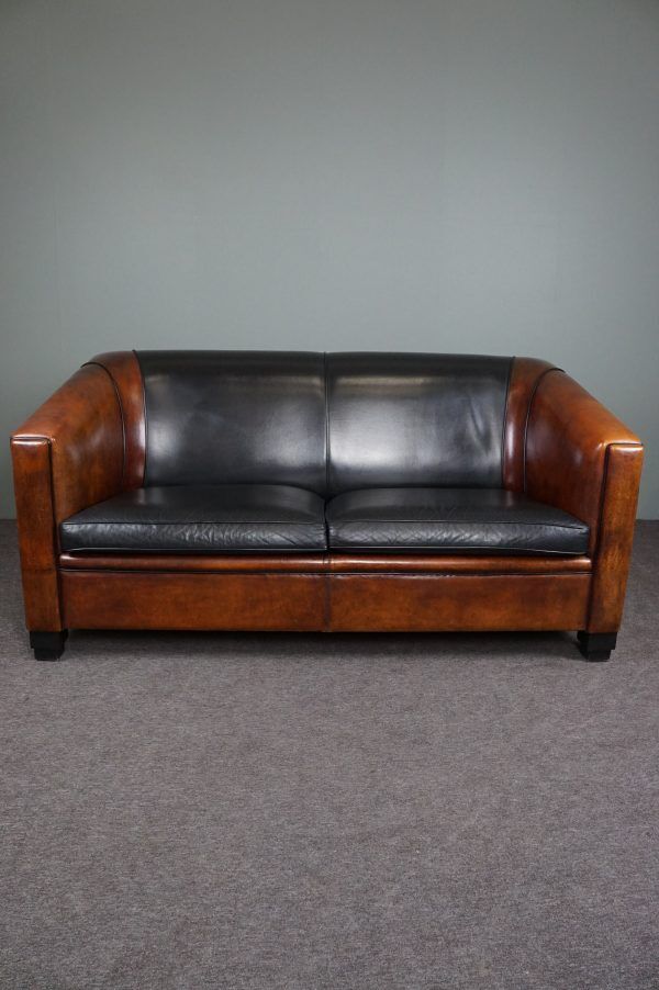 2.5-seater art deco style sofa in sheepskin