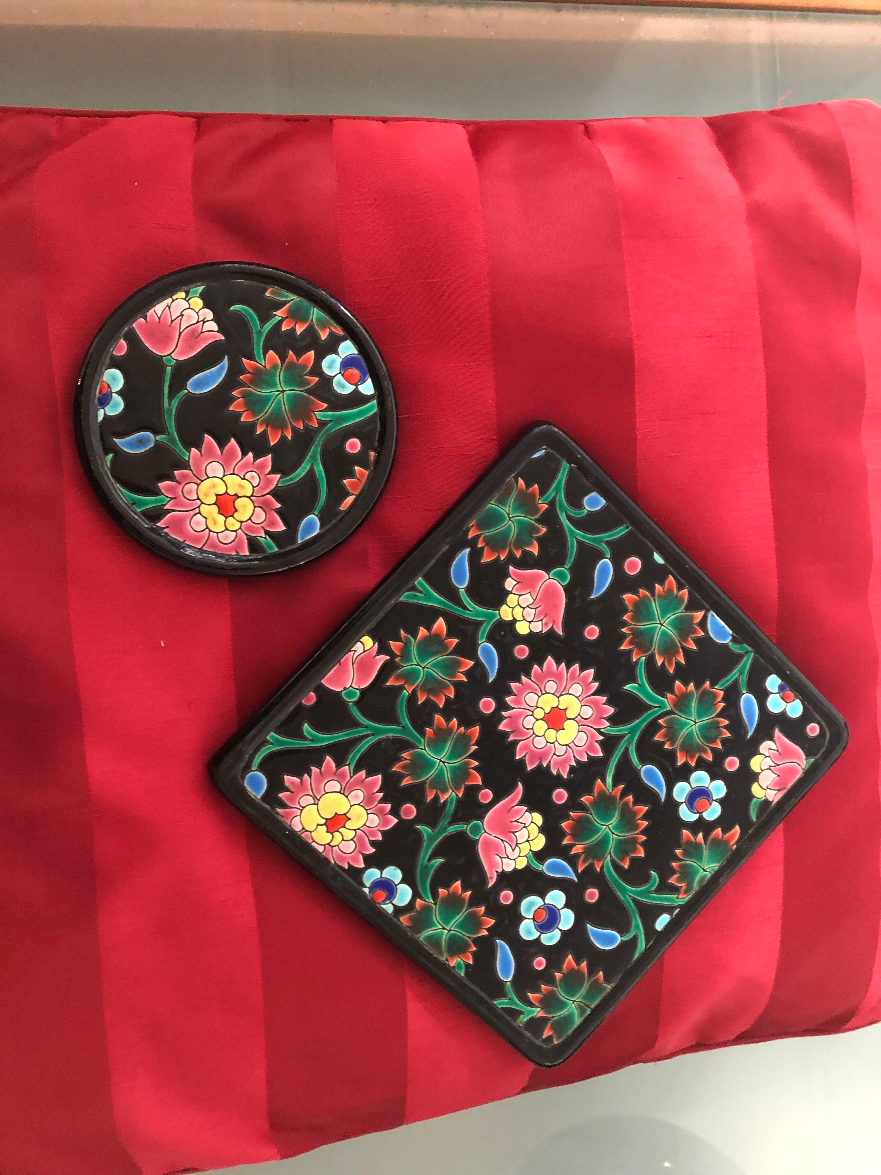 Underside and bottle made of Longwy enamels